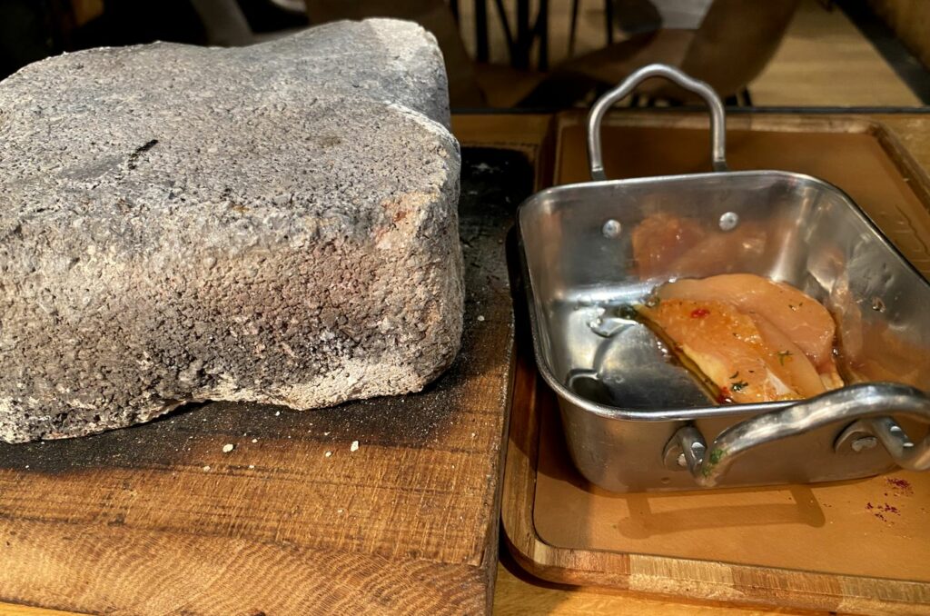 Brique de cuisson du restaurant Félicie, un investissement de projet de restaurant à chiffrer avant d'ouvrir